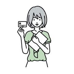 立って書類とカードを手に持つオフィスカジュアルの女性