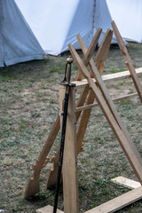 reconstruction of a 17th century military camp with tents and military utensils at a summer festival