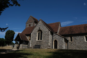 Fototapeta na wymiar Tranquil Sanctity: An Idyllic English Country Church amidst Lush Countryside