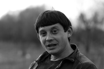 Outdoors portrait of a man in black and white