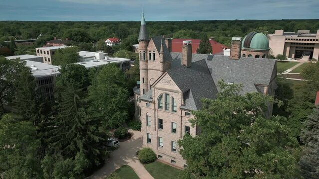 flying clockwise around Peters Hall at Oberlin College in Ohio