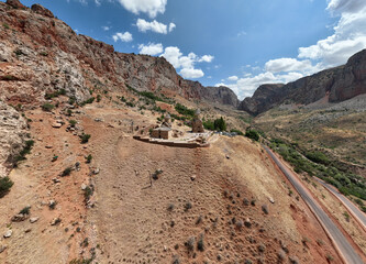 panoramic view of a mountain landscape with an old Christian church against the sky in Armenia taken from a drone