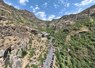 panoramic view of a mountain landscape with an old Christian church against the sky in Armenia taken from a drone