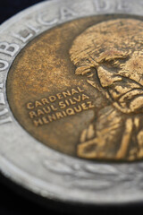 Translation: Republic of Chile. Coin of 500 Chilean pesos close-up. Peso of Chile. News about economy or banking. Loan and credit. Money and taxes. Vertical illustration. Macro