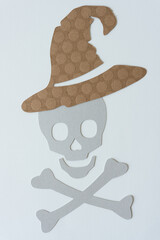 skull and crossbones and witch's hat