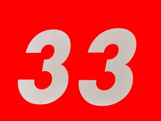 pattern and design from repeating number 3 white on red