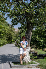 woman tourist on the background of ancient buildings in Armenia