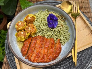 Green tea noodle with roast chicken and dumplings