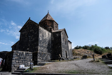 Fototapeta premium landscape with views of ancient stone buildings and temples on a summer day near Lake Sevan in Armenia