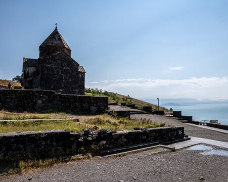 landscape with views of ancient stone buildings and temples on a summer day near Lake Sevan in Armenia