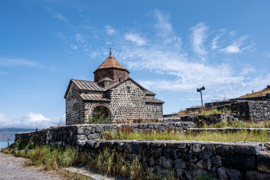 landscape with views of ancient stone buildings and temples on a summer day near Lake Sevan in Armenia
