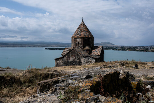 landscape with views of ancient stone buildings and temples on a summer day near Lake Sevan in Armenia