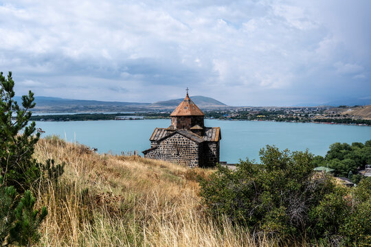 landscape with views of ancient stone buildings and temples on a summer day near Lake Sevan in Armenia