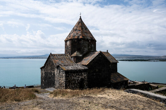 landscape with views of ancient stone buildings and temples on a summer day near Lake Sevan in Armenia