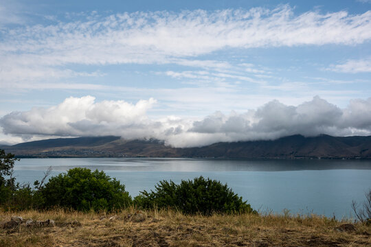 landscape with views of ancient stone buildings and temples on a summer day near Lake Sevan in Armenia