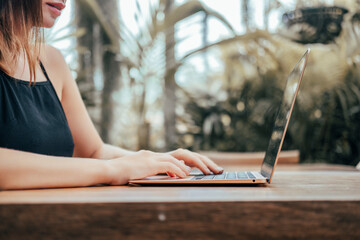 Pretty  Woman Using Laptop in cafe, outdoor portrait business woman, hipster style, internet,...