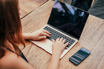 Pretty Young Beauty Woman Using Laptop in cafe, outdoor portrait business woman, hipster style, internet, smartphone, office, Bali Indonesia, holding, mac OS, manager, freelancer 