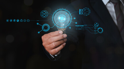 Fototapeta premium Businessman holding glowing light bulb with digital transformation change management, internet of things.