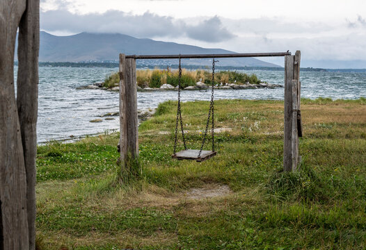 landscape with views of Lake Sevan and mountains and clouds on a summer day in Armenia