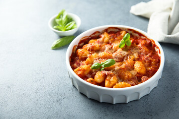 Baked potato gnocchi with tomato sauce and basil