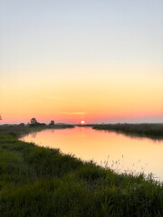 Obraz premium sunrise over the Biebrza river