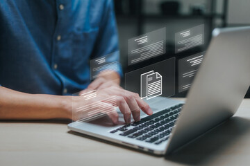 Businessman working on laptop with virtual screen. Process automation to efficiently manage files. Online documentation database and document management system concept.