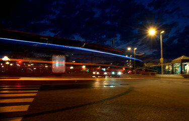 Marker lights of transport in motion among the night city
