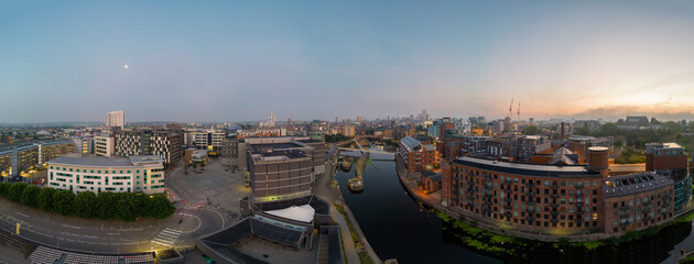 Obraz premium A drone aerial panorama showing thee Leeds docks and surrounding area including the royal armories