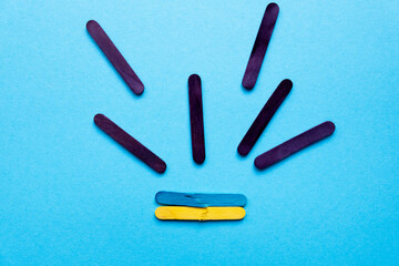 war in Ukraine. Broken Ukrainian flag on a blue background. Rockets fly to Ukraine