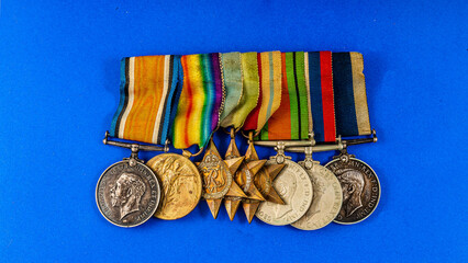 A lifetime group of 8 British war medals won by a veteran of the Royal Navy during World Wars I and II.   