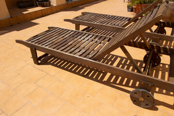 wooden sun chairs for terrace sunbathing