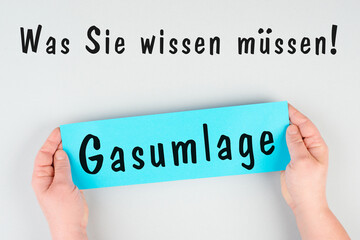 Gas commission is standing in german language on the paper, new fee regualtion in Germany, risk for...