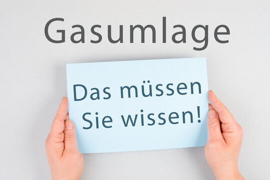 Gas commission is standing in german language on the paper, new fee regualtion in Germany, risk for impoverishment of the population, energy crisis