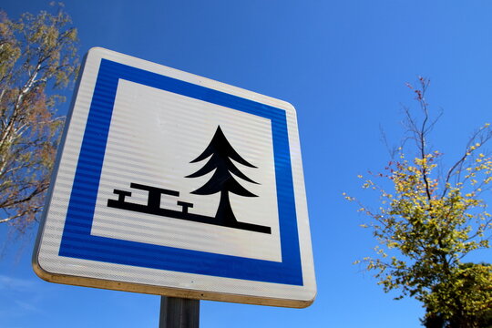 Rest area sign on the road
