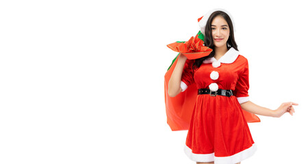 Young woman wearing red Santa Claus costume and Santa Claus Hat holding Santa Claus bag Look at...