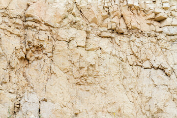 Ruins in a quarry. Dumps of clay and crushed stone in a quarry.