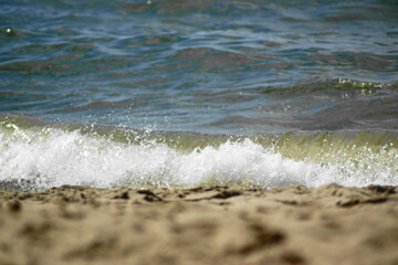 Waves in a sea with beach
