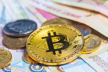 Russian rubles in banknotes and coins and coin bitcoin