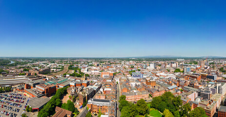 high aspect aerial view of Fishergate main street and over the town cityscape of Preston,...