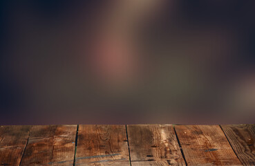 Wooden surface on the background of a blurred backdrop