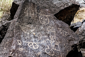 Some of the four hundred petroglyphs in Piedras Marcadas Canyon, part of New Mexico's Petroglyph...