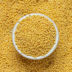 Millet groats background. Top view.
