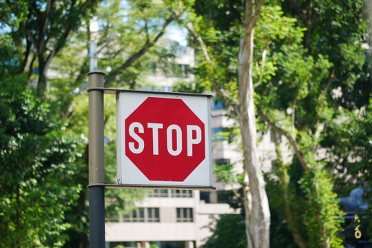 Stop sign in a empty road 