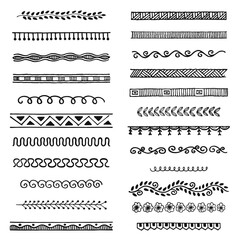 Obraz premium Hand drawn vector dividers, lines, borders and laurels set, doodle design elements.