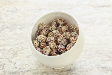Sweet peanut in sesame seeds