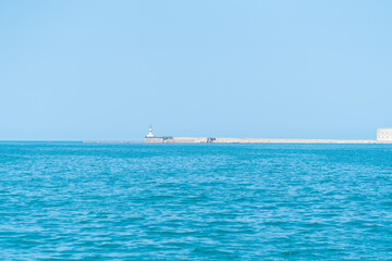 Fototapeta na wymiar Sevastopol Crimea sea russian bay blue coast water coastal mangust, concept patrol summer from light from tower cape, ocean beautiful. Old nautical seascape,