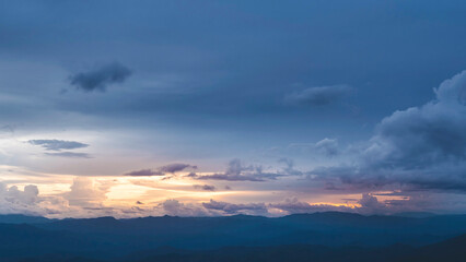 Fototapeta premium Beautiful landscape of mountain range during sunrise morning dawn. Mountain peaks with cloud and sunlight at dawn. Chiang Mai, Thailand.