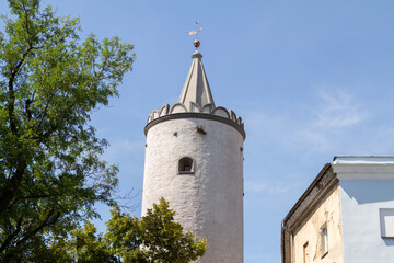 Fototapeta na wymiar Klodzko Tower and Gate (Wieża bramna Kłodzka Paczków), also known as the Upper Gate (Obertor) in Paczkow, Poland. Part of medieval city fortifications and defensive walls.