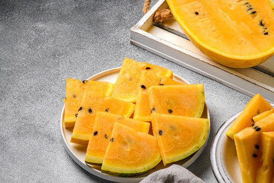 yellow watermelon on a gray background