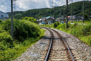 Fototapeta na wymiar 田舎に一直線に伸びる線路 　レール 　rail　line
